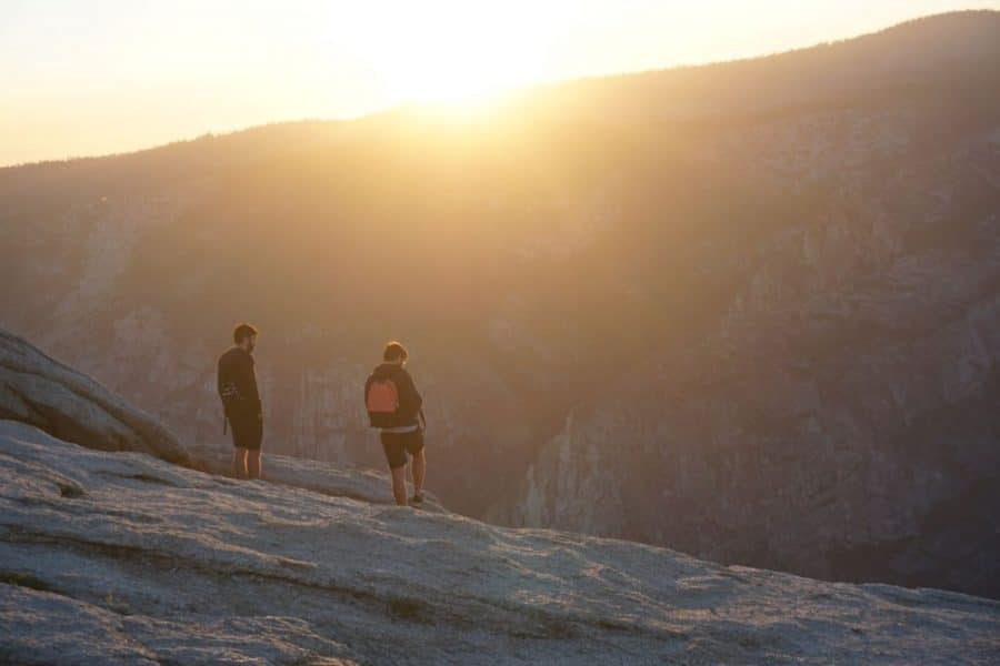 Two Hikers at Sunset on Sentinel Dome in Yosemite National Park