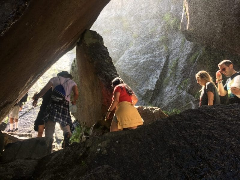 Hikers Getting Soaked by Vernal Falls along THe Mist Trail