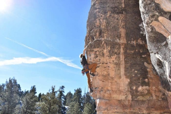 A Rock Climber Sport Climbing at 'The Pit' Climbing Area near Flagstaff, Arizona