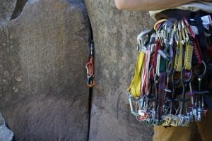 Trad Rack hanging off of a Rock Climbing Harness