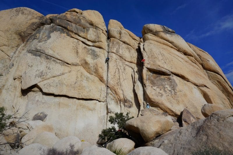 A climber on Double Cross in Joshua Tree National Park