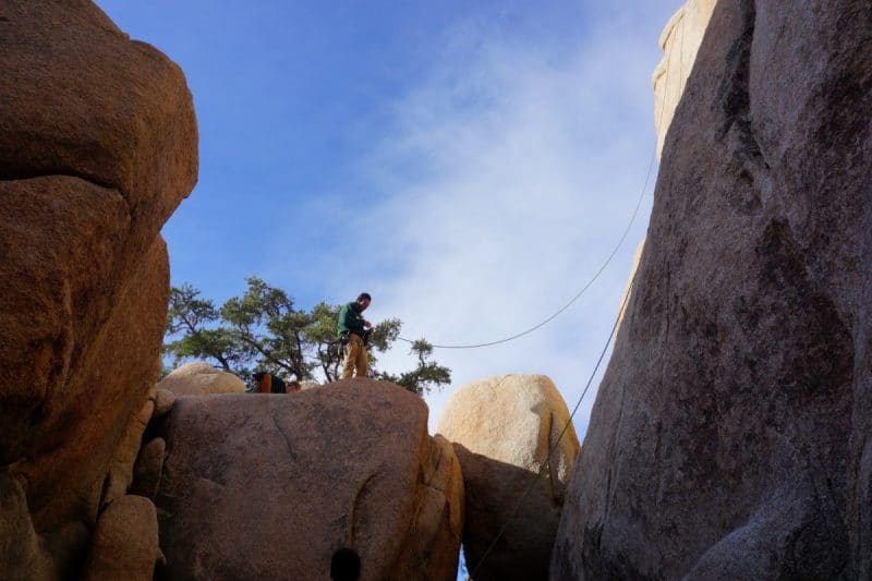 A climber on Leaping Leaner in Joshua Tree National Park