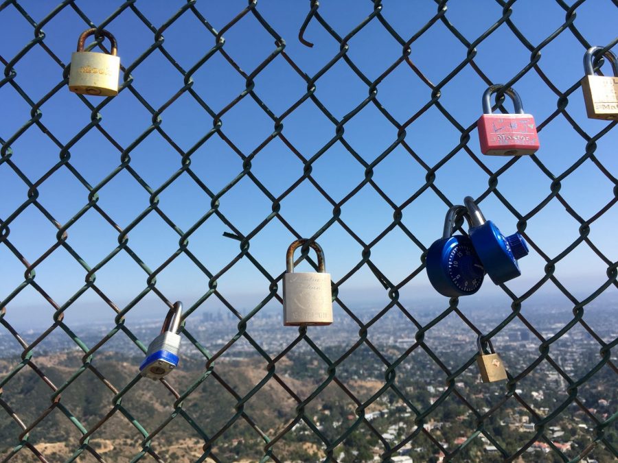 Padlocks Left by Hikers on the Fence above the Hollywood Sign